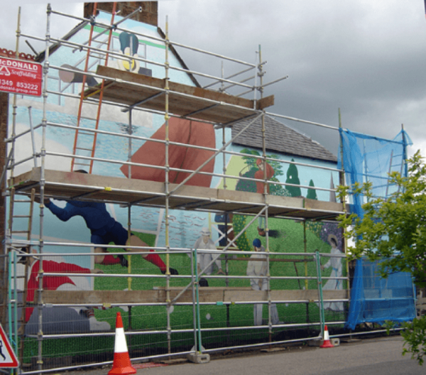 A Century of Sport mural and scaffold